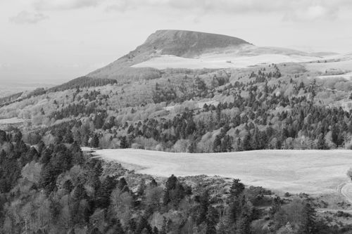 Free Serene black and white image capturing Mont-Dore's mountainous landscape. Stock Photo