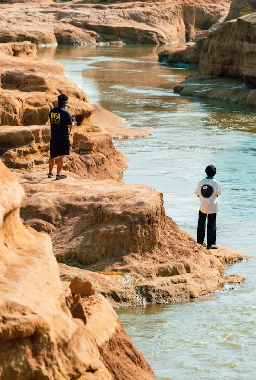 Two Fishermen on a Cliff