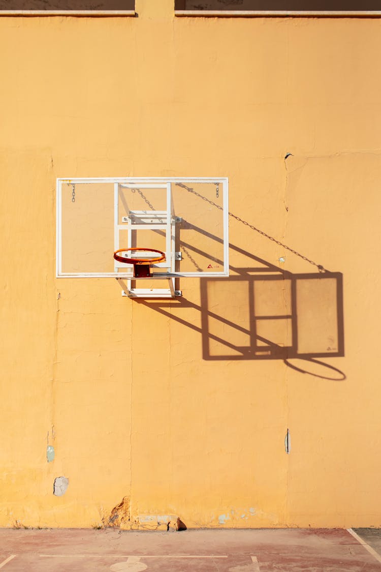 A Basketball Hoop Attached To A Wall