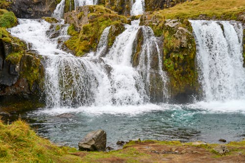 Waterfalls on Green Rocks