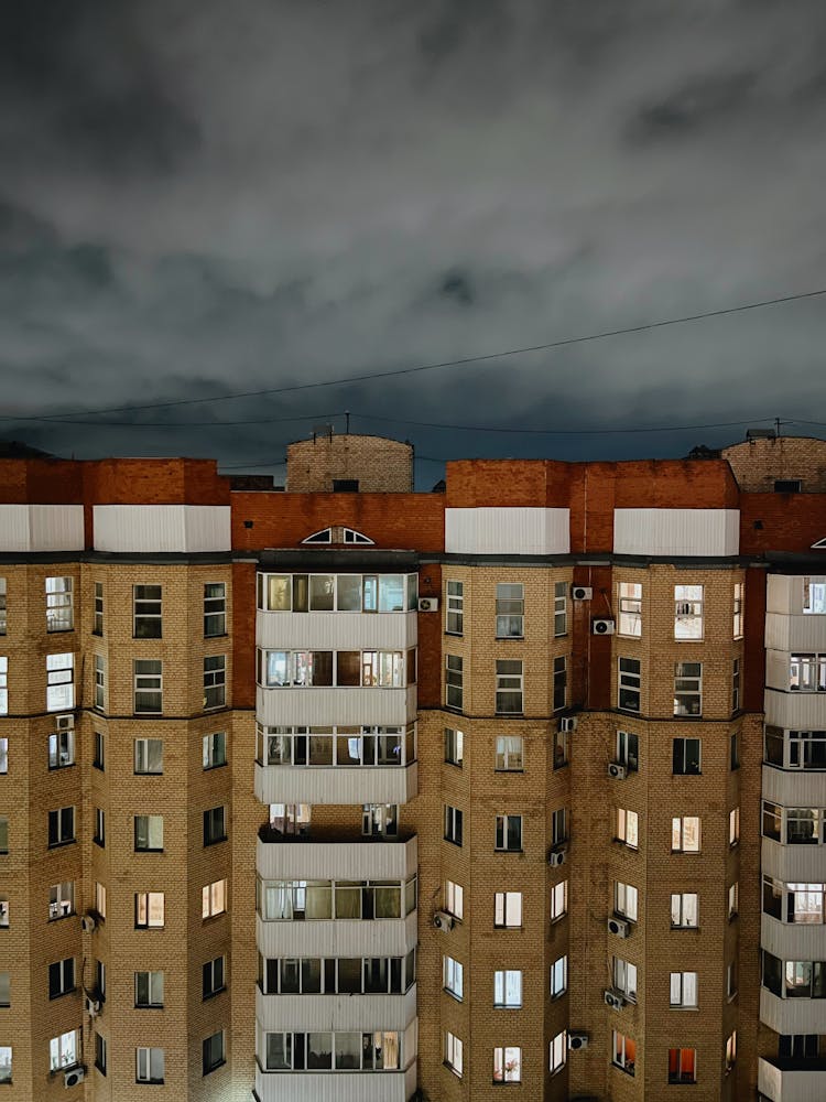 Residential Building Under Storm Clouds