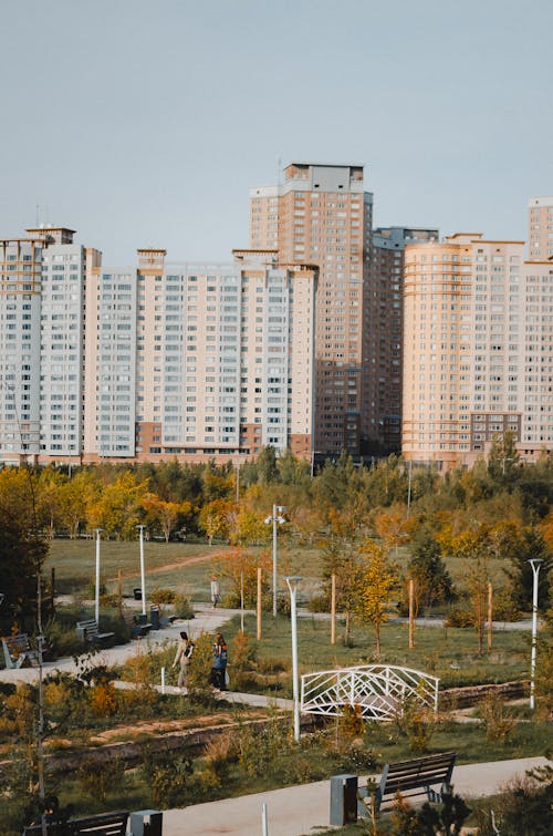 Park by Residential Buildings in City