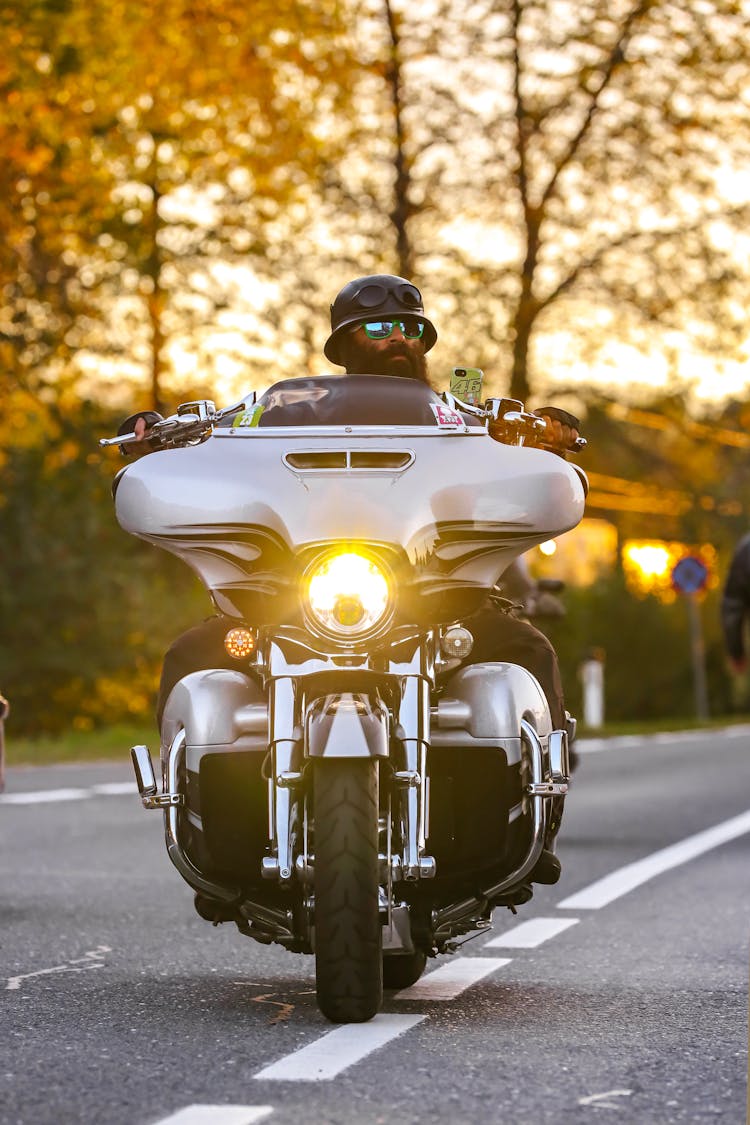 Man Riding A Bike On A Highway