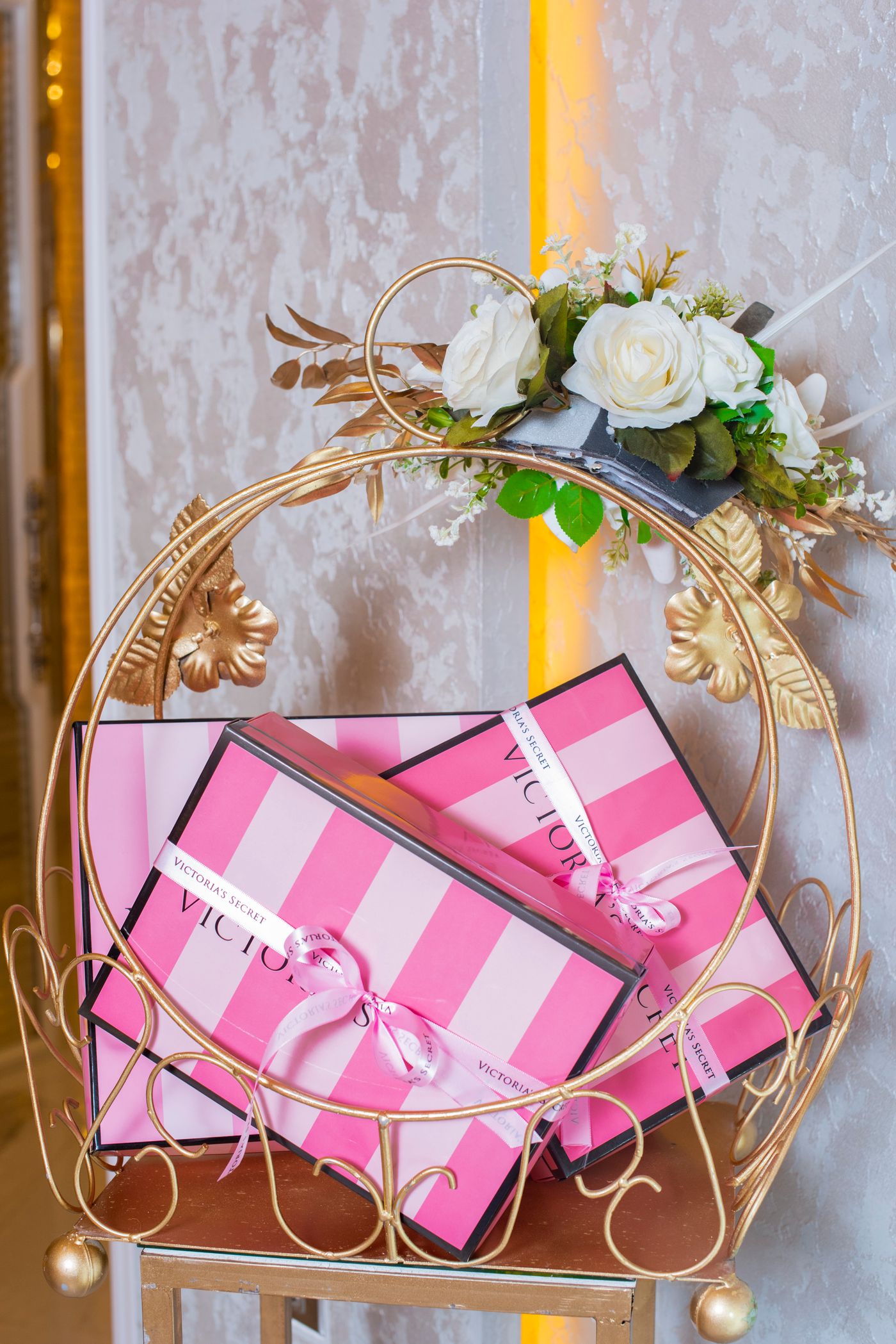 Beautifully arranged pink gift boxes with floral decoration