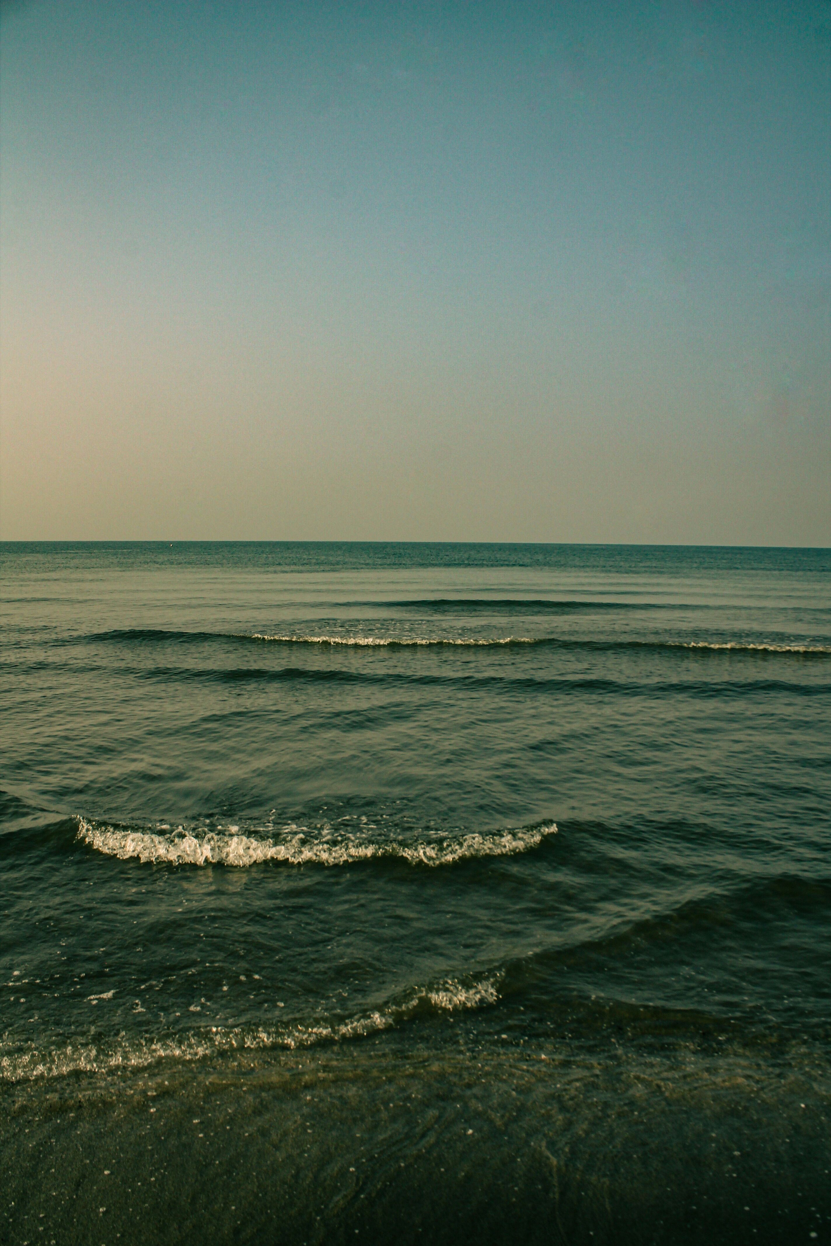 Sea Waves Under White Clouds and Blue Sky · Free Stock Photo