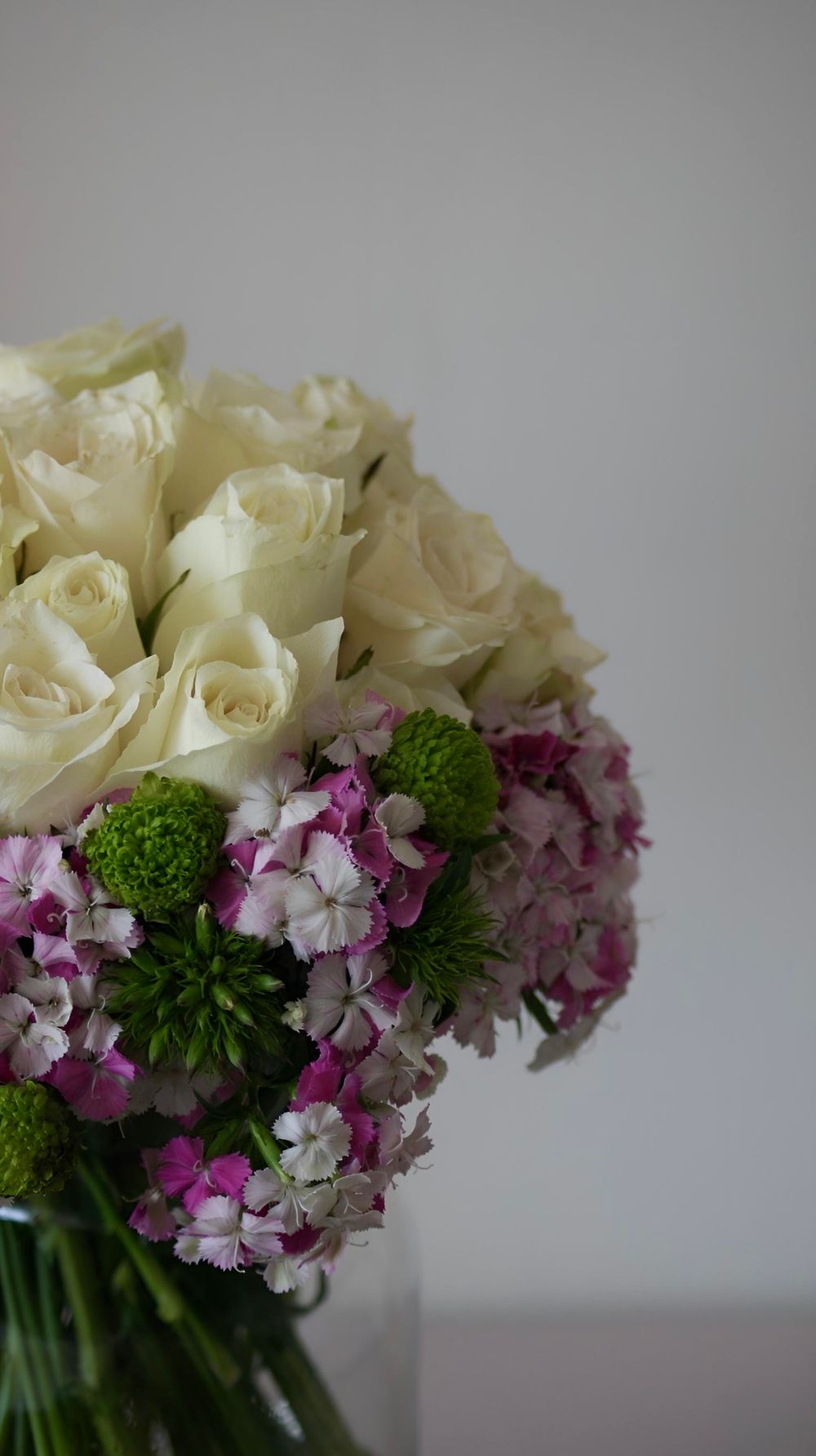Colorful flowers arranged in a vase