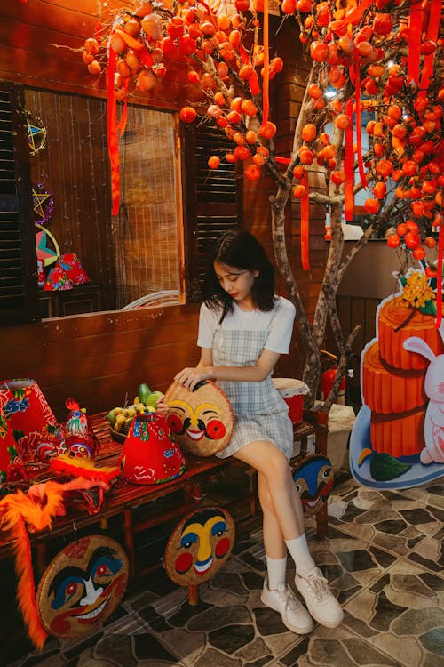 Gratis lagerfoto af asiatisk kvinde, dekorationer, farverig