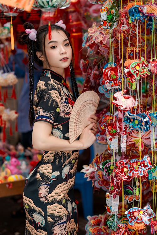 Young Chinese Woman with a Fan in her Hand 
