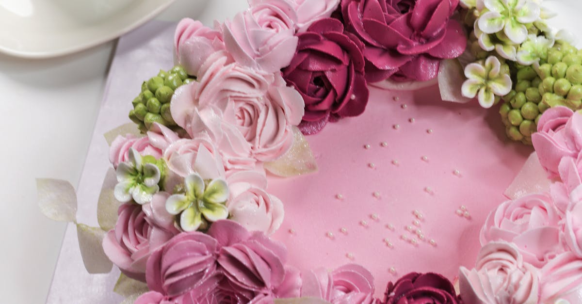 Pink Icing Cake Topped with Icing Roses · Free Stock Photo
