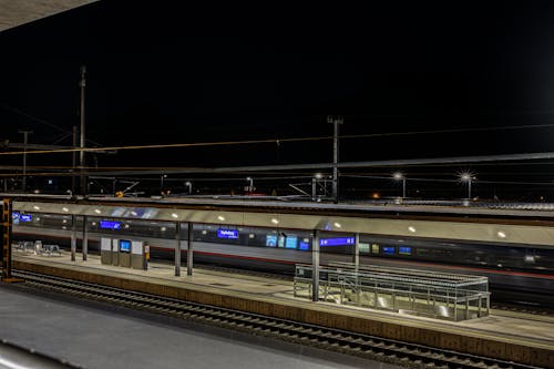 Modern Train at the Station at Night 