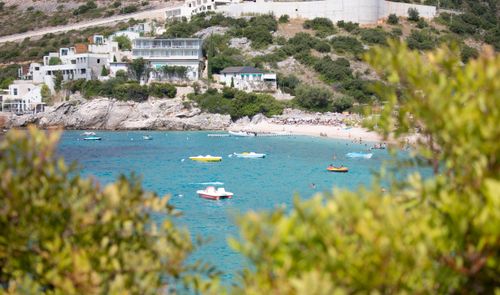 Free A stunning birds-eye view of the vibrant coast in Vlorë County, Albania, featuring clear waters and lush hills. Stock Photo