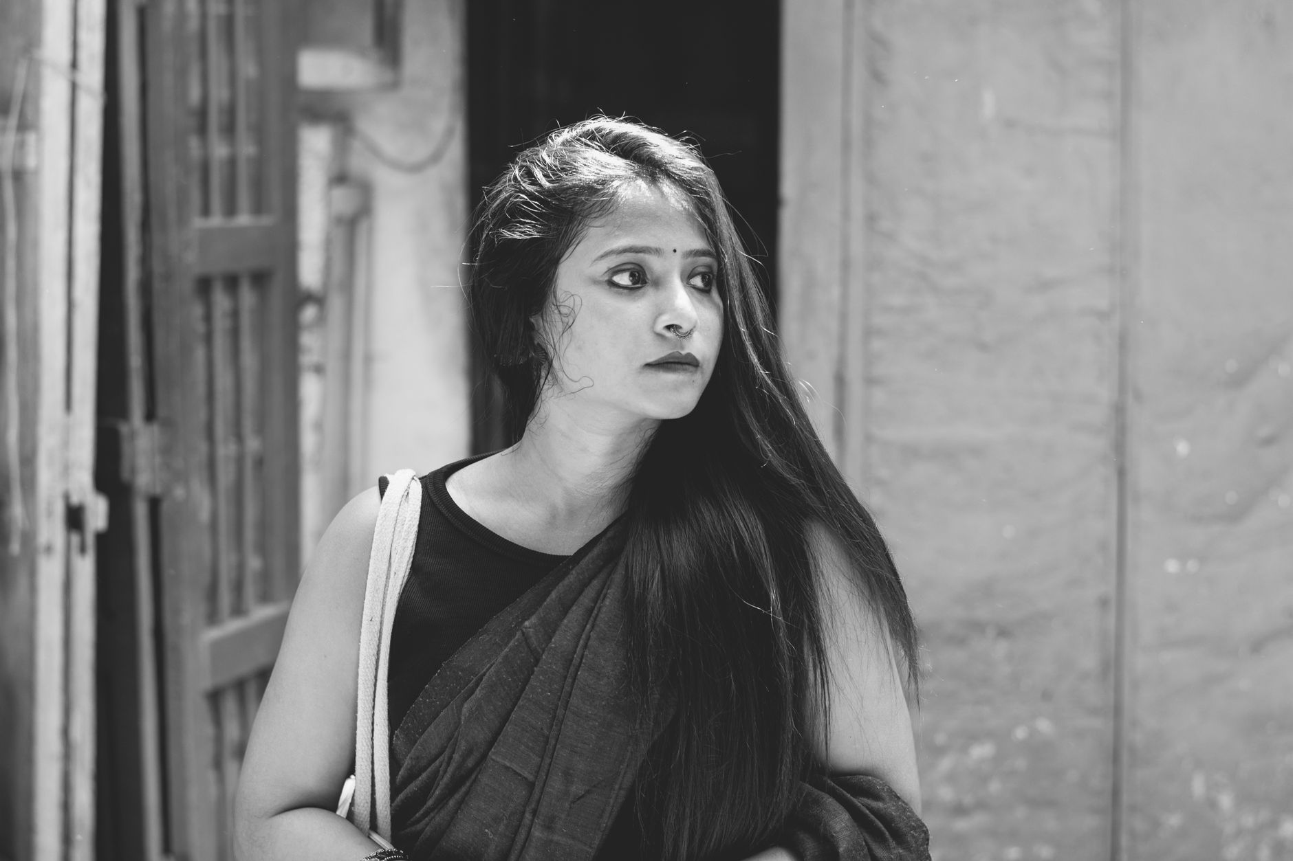 Dimple Kapadia's Granddaughter Naomika Saran Turns Heads in Black Saree at 'The Odyssey' Event