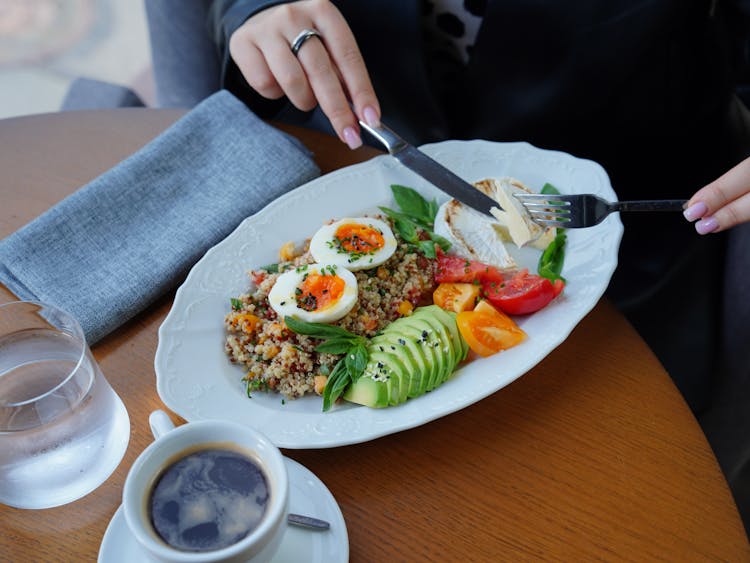 Woman Eating Breakfast