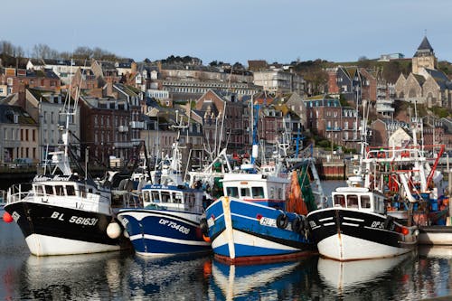 Fishing Boats against City