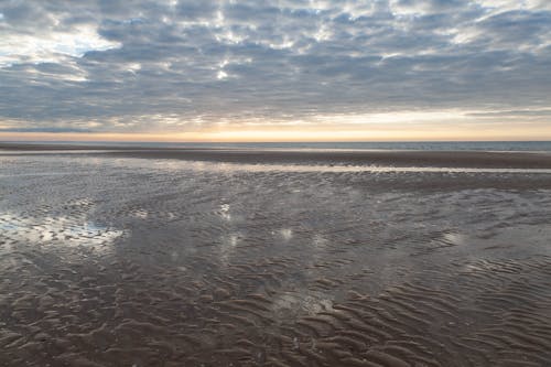 Foto profissional grátis de areia, cênico, litoral