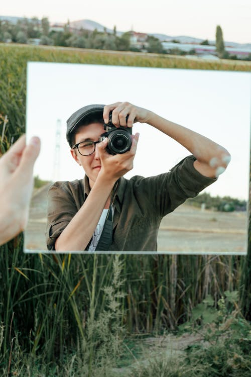 Photographer Taking Selfie in Mirror