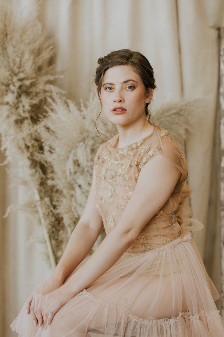 Studio Shot Of Model In Sepia Dress