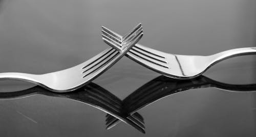 Free Forks on a Table Stock Photo