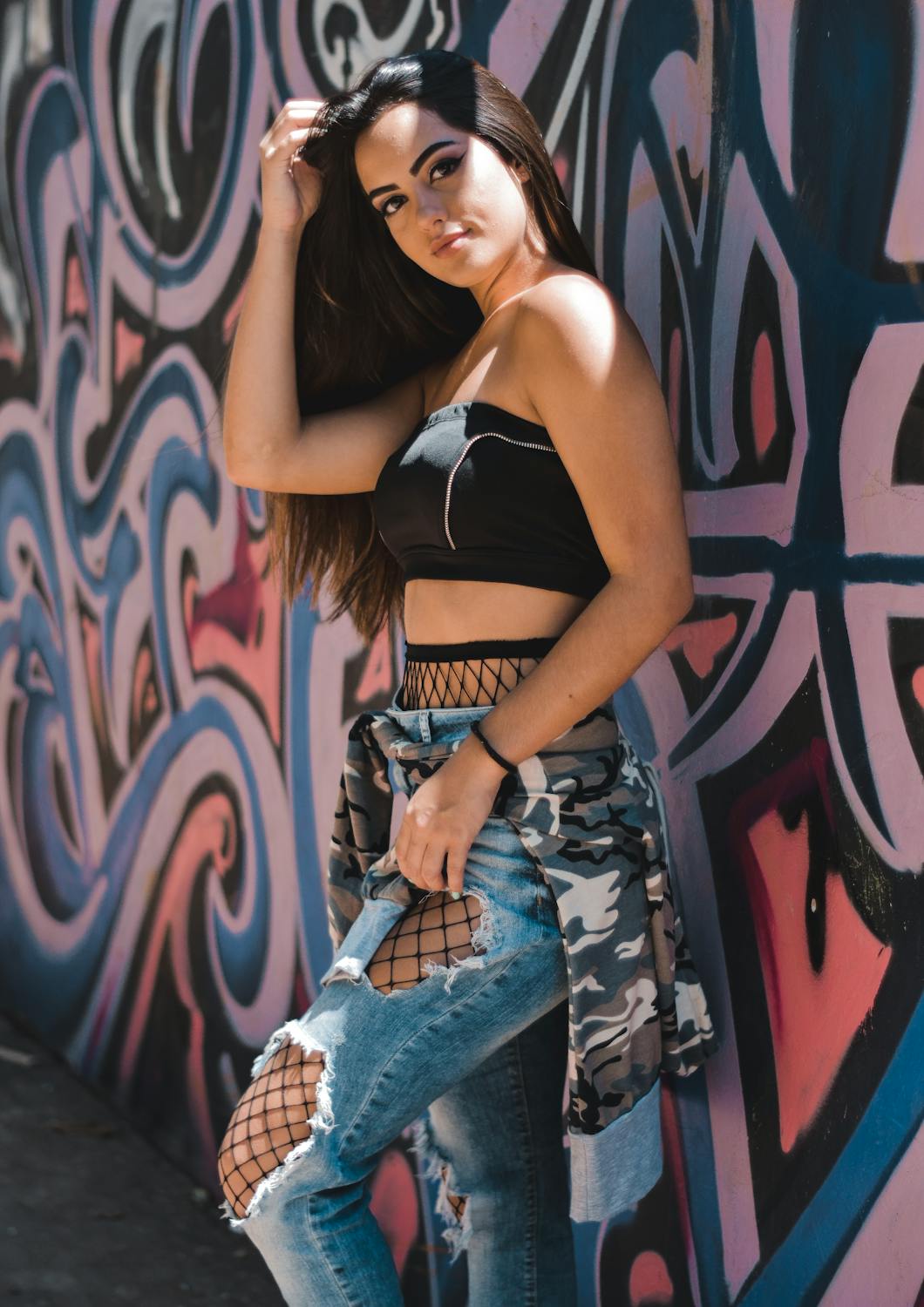 Woman Standing Beside Wall With Graffiti Free Stock Photo woman-standing-beside-wall-with-graffiti-free-stock-photo