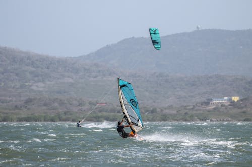 Windsurfer Racing with Kiteboarder