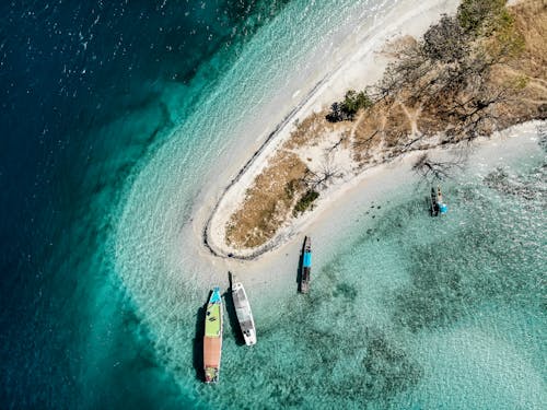 Aerial View Of Canoes On Shore