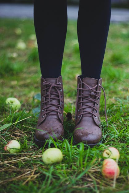 Person Wearing Brown Leather Combat Boots · Free Stock Photo