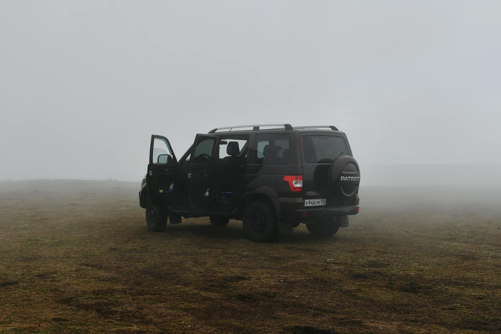 UAZ Patriot on Grassland under Fog