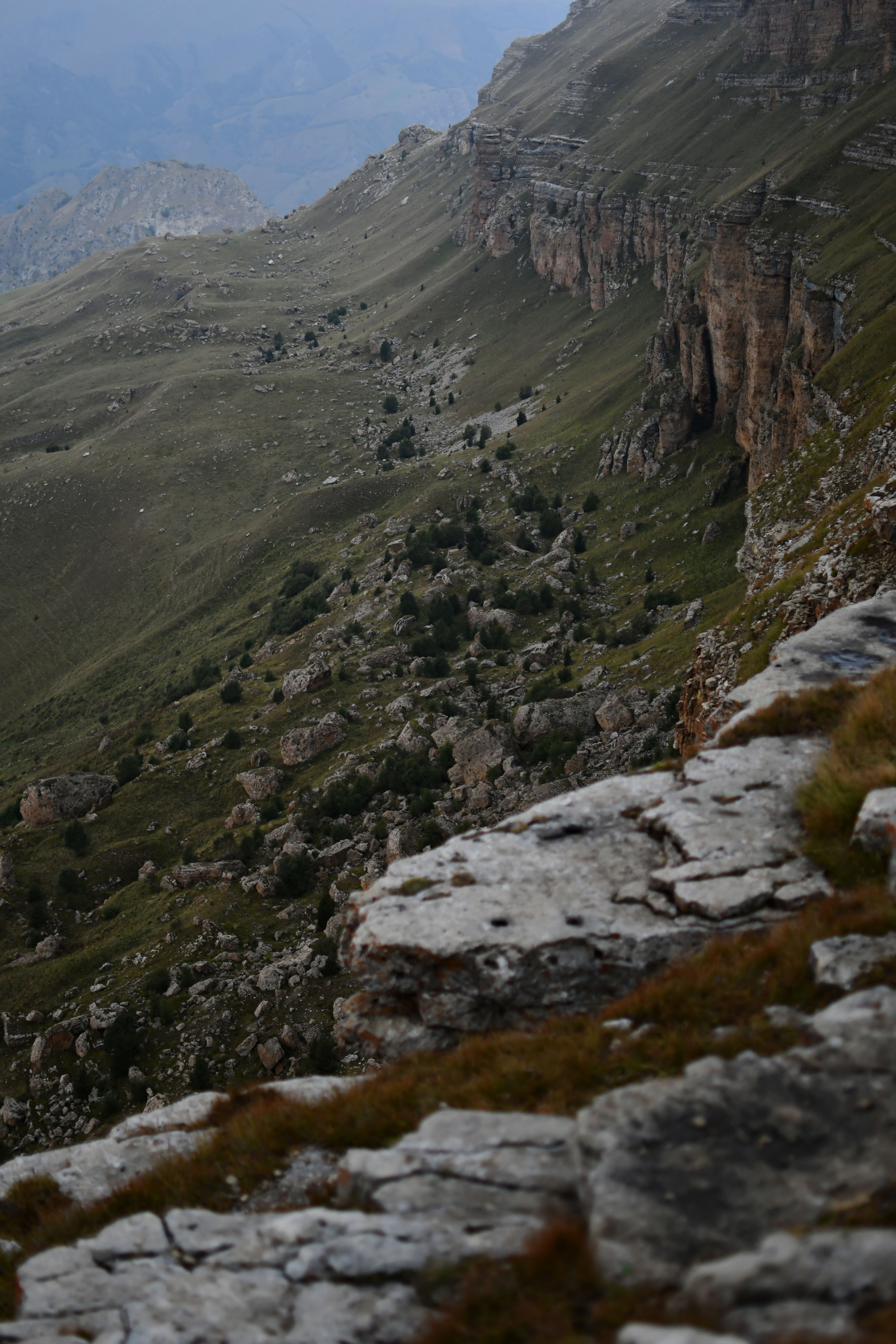 Rocks over Green Hill · Free Stock Photo