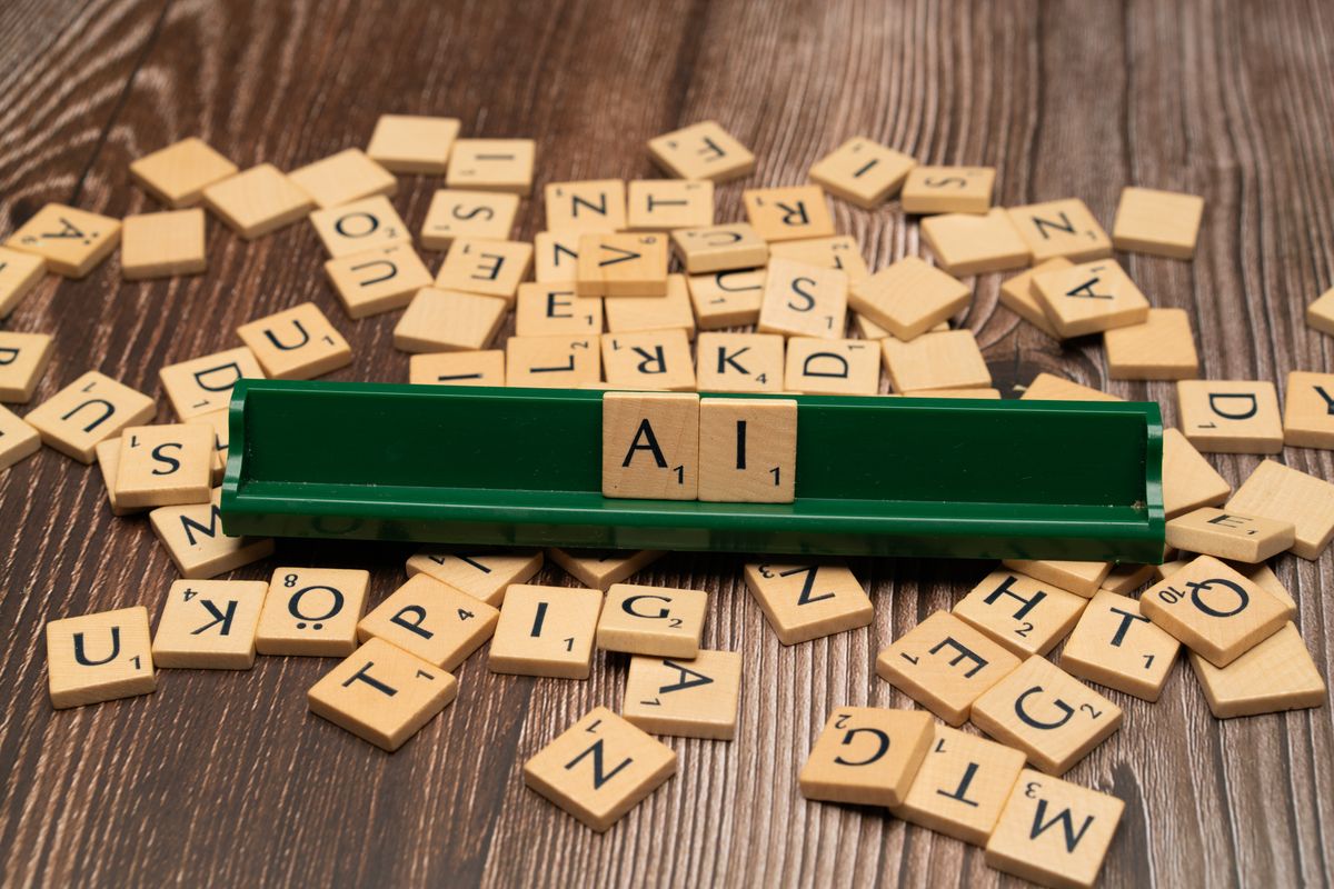 NLP failure points: negation, loanwords and intent Letter tiles spelling AI among scattered letters