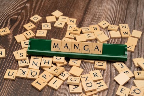 The word manga is spelled out with scrabble tiles