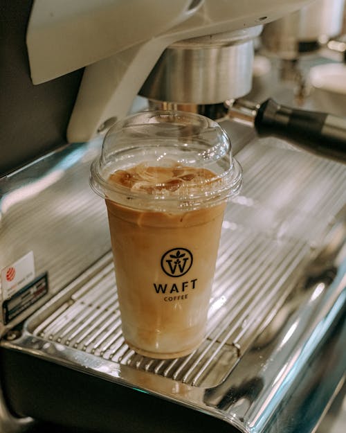 Coffee Being Prepared at Cafe