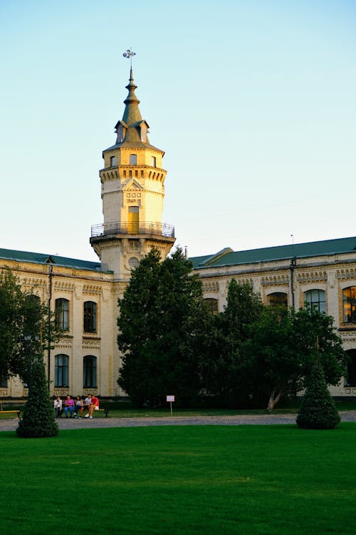 Palace Tower over Courtyard with Trees and Lawn