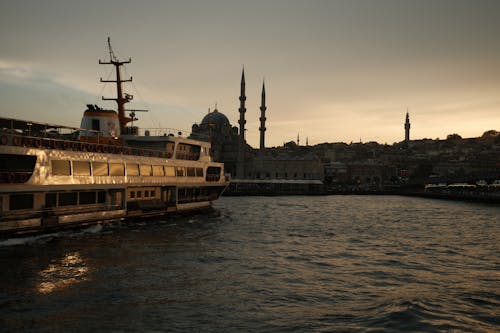 Ferry on Sea Coast in Istanbul at Sunset