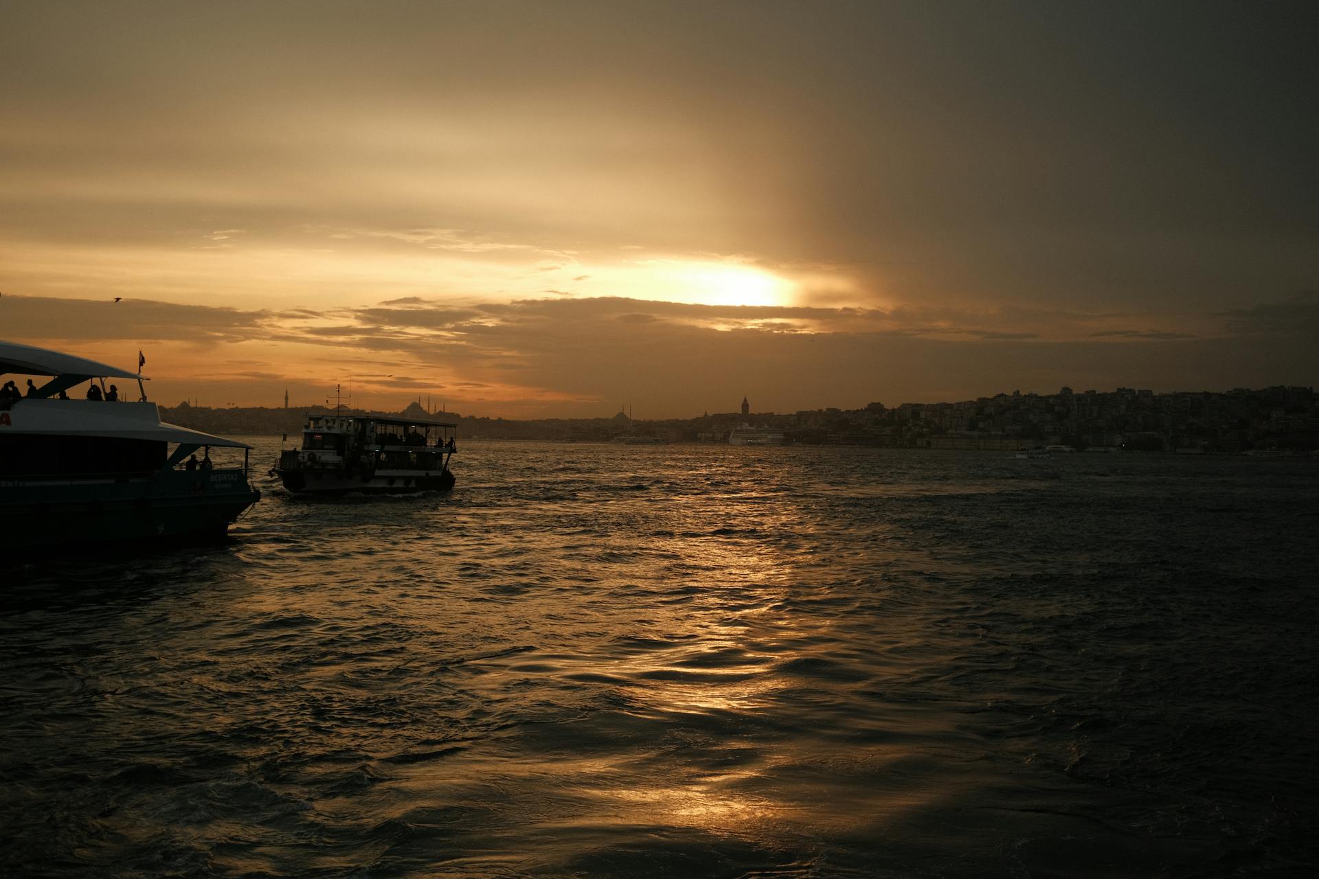 Ferries Sailing in Istanbul at Sunset