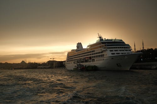 Cruise Ship on Sea Shore in Istanbul at Sunset