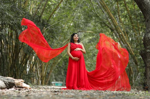 Pregnant Woman in Red Dress