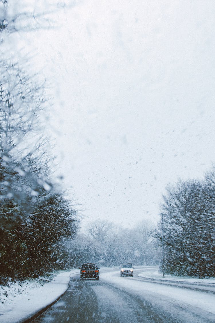 Cars On Road With Snow