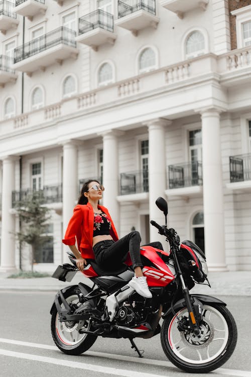 Woman Sitting on Motorbike on Street in Baku