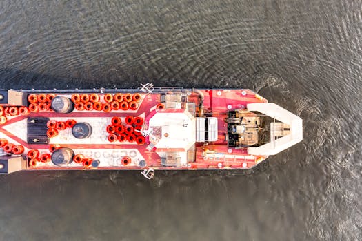 Drone shot of a cargo ship navigating the waters of Reads Landing, Minnesota.