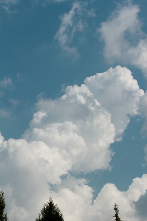 Cumulus Clouds against Blue Sky 