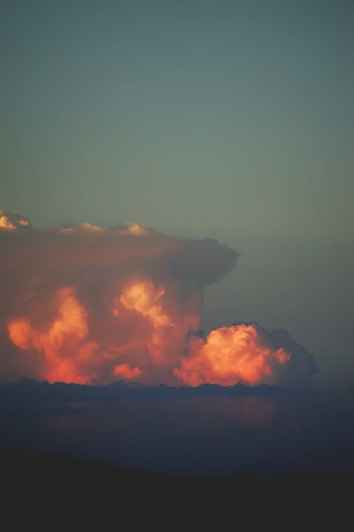 Dramatic Sky with Fluffy Clouds at Dawn