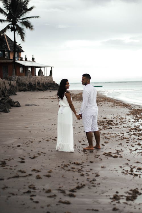 Couple Standing on Shore