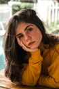 Photo of Woman Wearing Yellow Sweater