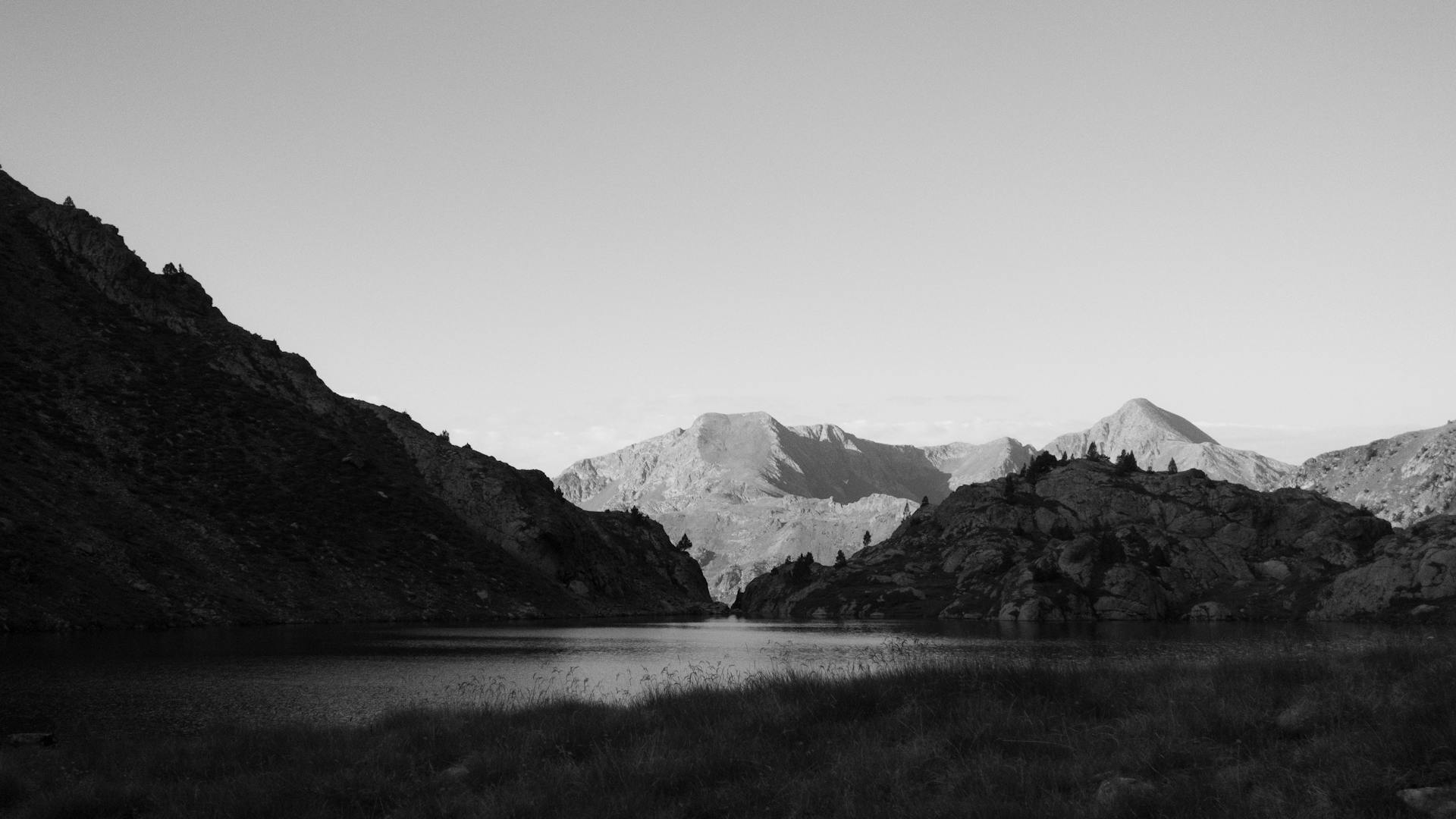 Lake Surrounded by Rugged Mountains