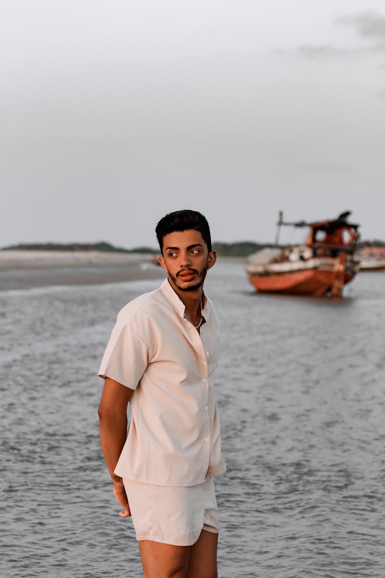 Man Standing In The Sea