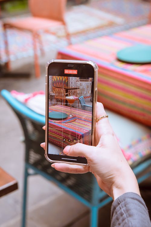 Taking Photo of Drink on Table with Smartphone