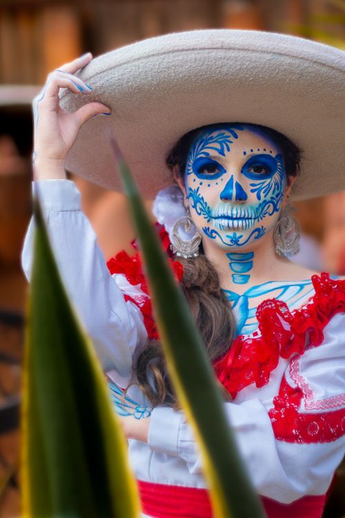 Free Colorful depiction of a woman in traditional Day of the Dead costume in Ciudad de México. Stock Photo