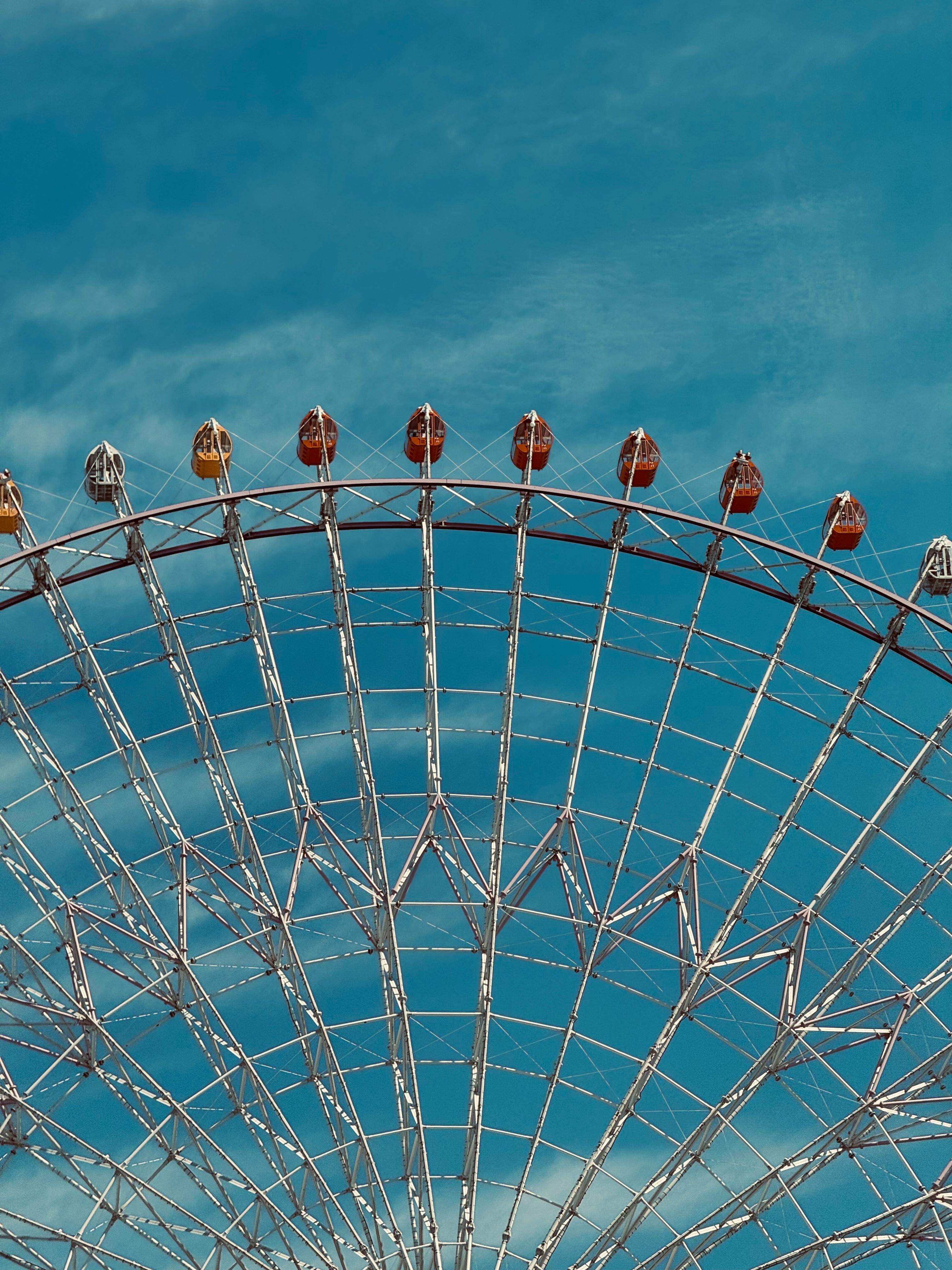 Ferris Wheel against Blue Sky with White Clouds · Free Stock Photo