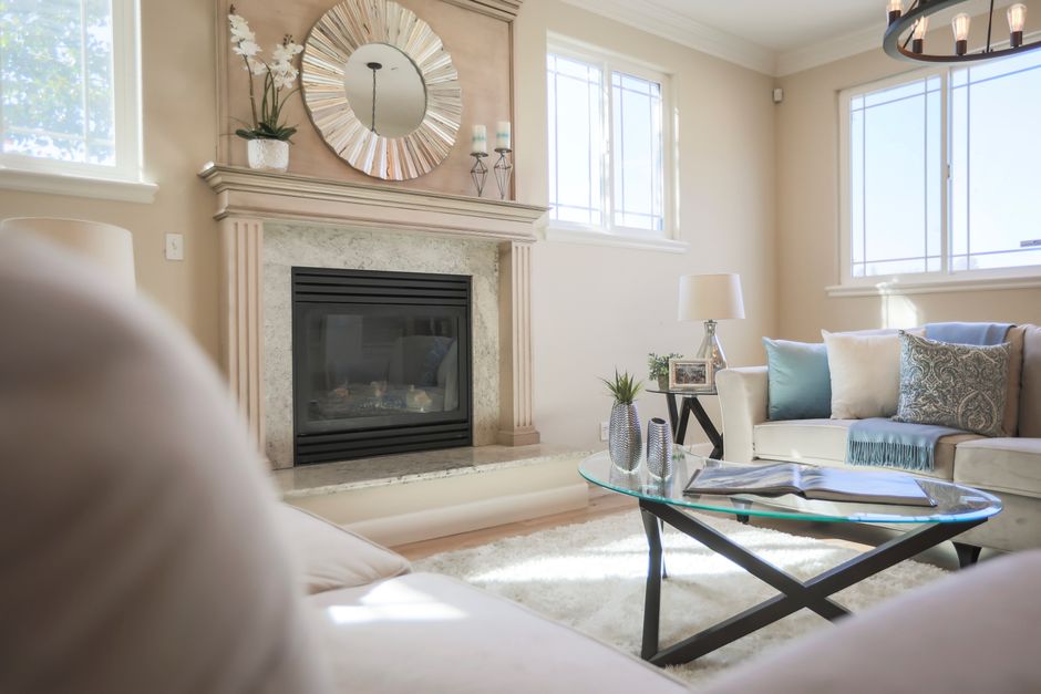 Bright, elegant living room with a stylish custom fireplace installation in a Riverside CA home
