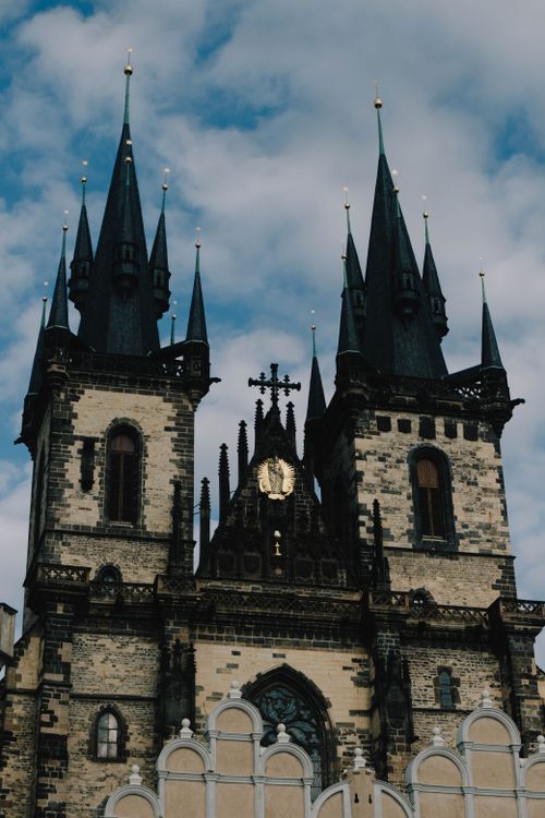 Free Detailed view of the Gothic Church of Our Lady before Týn in Prague, featuring iconic spires. Stock Photo